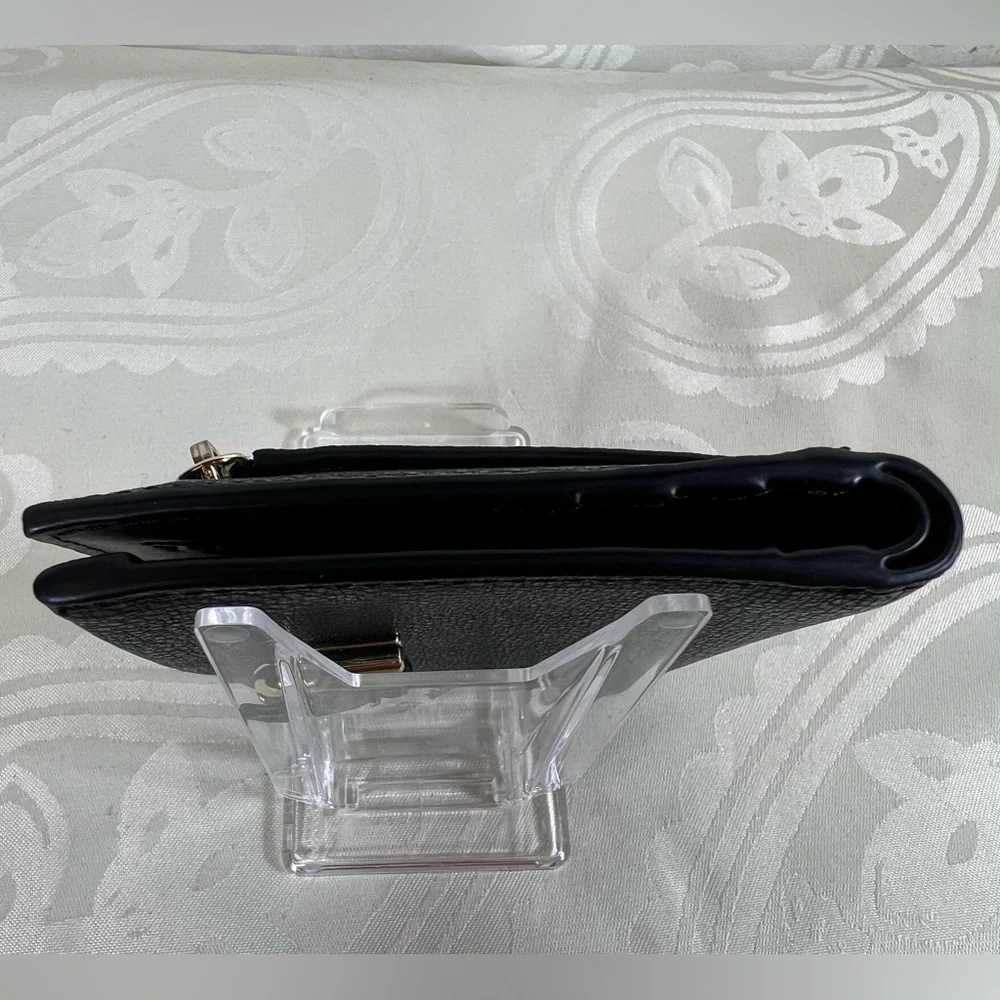 1017: Furla Black Pebbled Leather Compact Bifold Wallet